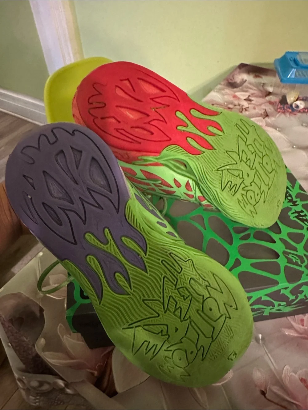 Puma Kids Mismatched Green Sneakers with Pink and Purple Accents